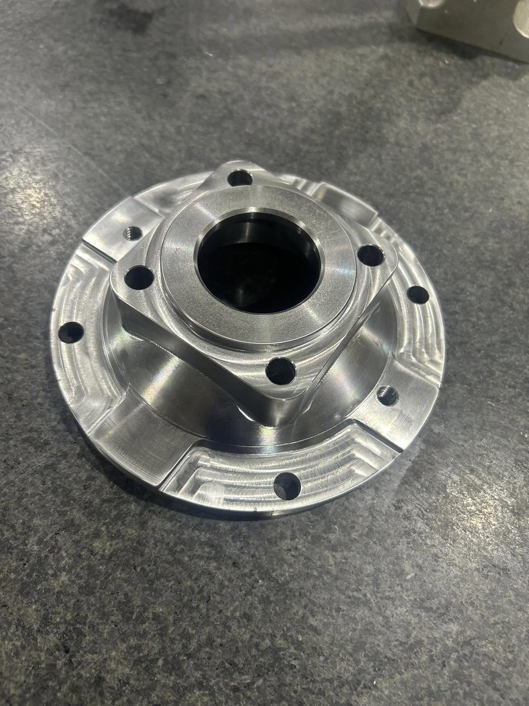 Reverse-engineered steel gearbox cover machined by PH
